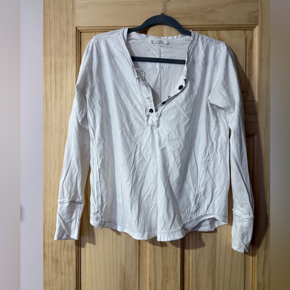 Women’s buttoned white long sleeve